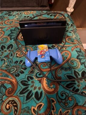 Nintendo Blue Mario Joy-Con Grip with Docked Switch